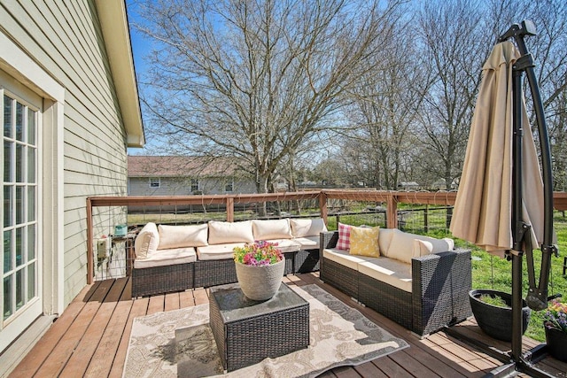 wooden deck with an outdoor hangout area