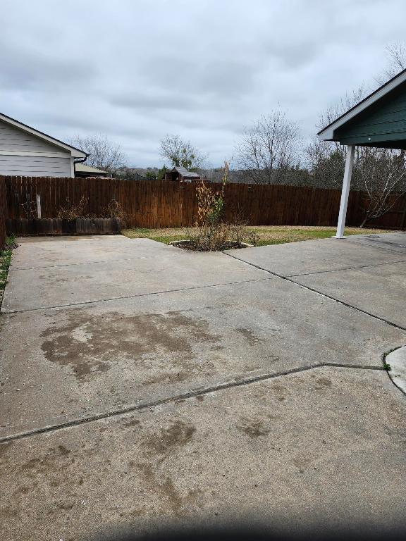 11801 Briarcreek Loop, Manor, TX 78653 - fenced backyard with a patio