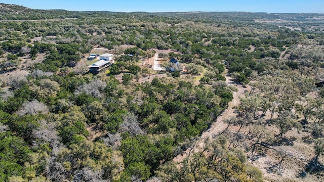 aerial view with a wooded view