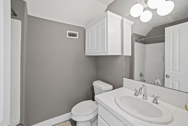 full bath with vanity, visible vents, baseboards, a shower, and toilet