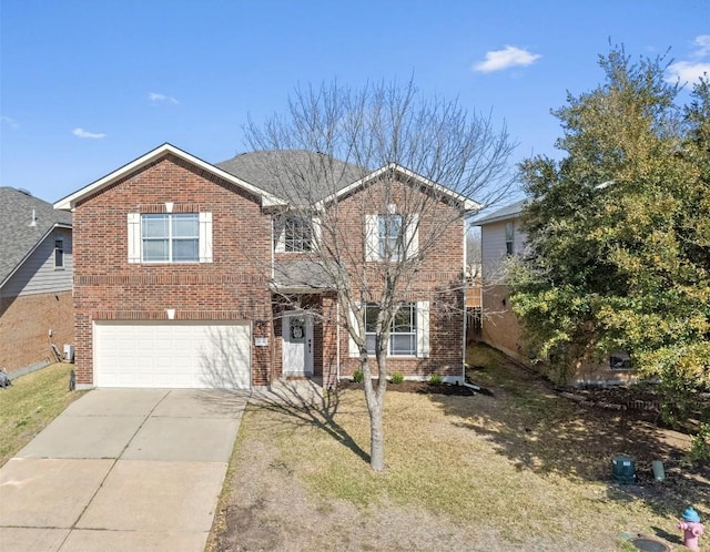 traditional-style home featuring a front lawn, brick siding, concrete driveway, and an attached garage