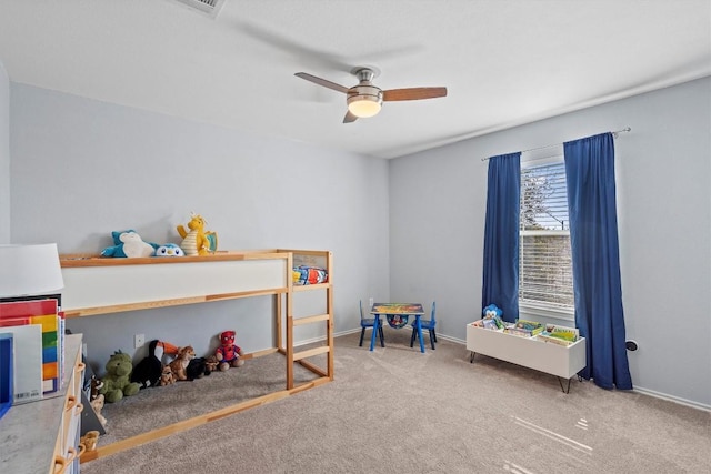 carpeted bedroom with a ceiling fan