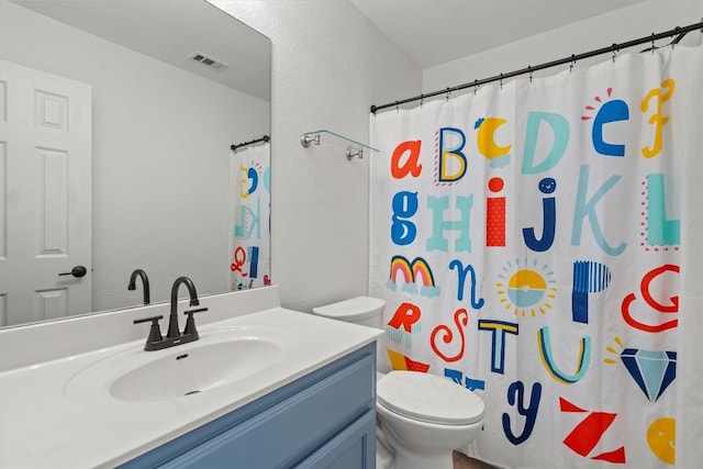 18516 Silent Water Way, Pflugerville, TX 78660 - full bathroom featuring vanity, toilet, and a shower with shower curtain