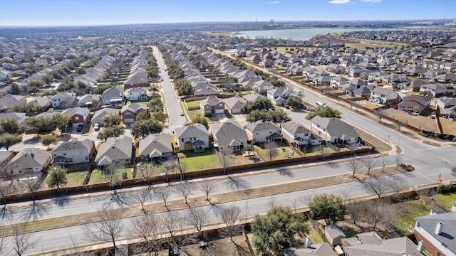 18516 Silent Water Way, Pflugerville, TX 78660 - aerial view of property and surrounding area featuring nearby suburban area and a large body of water