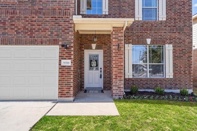 18516 Silent Water Way, Pflugerville, TX 78660 - property entrance featuring brick siding, a garage, concrete driveway, and a lawn