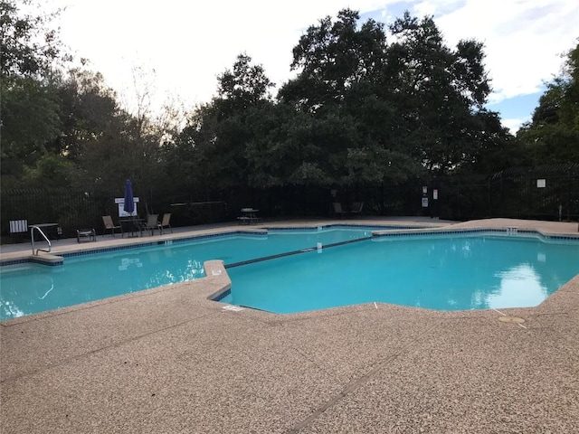 pool featuring a patio area