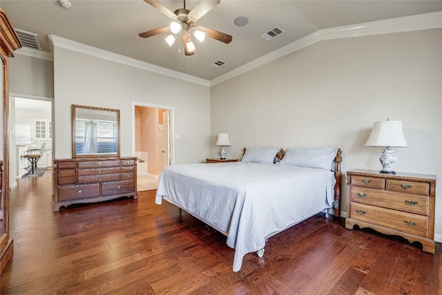 bedroom featuring visible vents, lofted ceiling, and wood finished floors