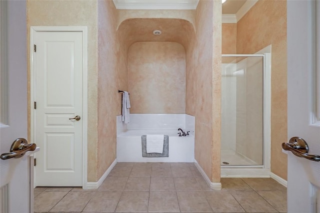 full bathroom with crown molding, a bath, a shower stall, and tile patterned flooring