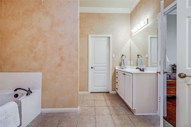 bathroom with tile patterned flooring, baseboards, ornamental molding, a bath, and vanity