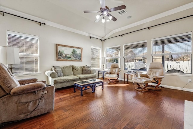 living area featuring visible vents, lofted ceiling, a ceiling fan, wood-type flooring, and baseboards