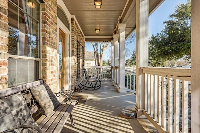 balcony featuring covered porch