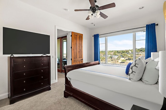 bedroom featuring recessed lighting, baseboards, light carpet, and ceiling fan