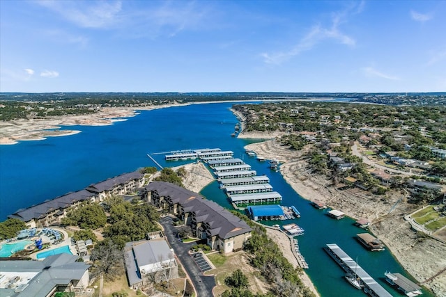 birds eye view of property featuring a water view