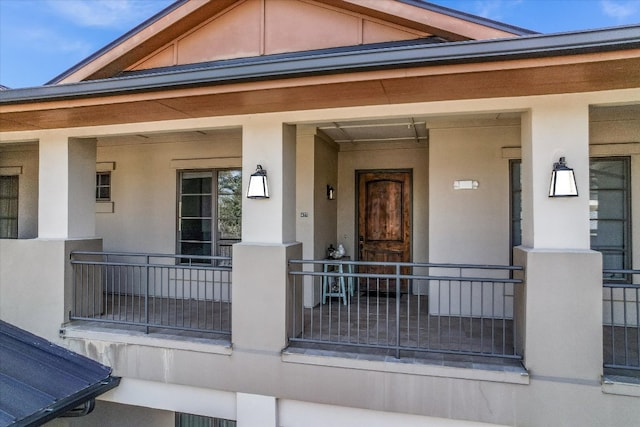 entrance to property with covered porch