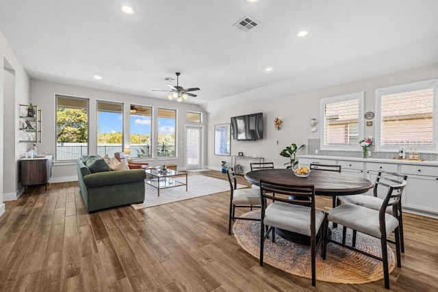 dining room with recessed lighting, visible vents, wood finished floors, and a ceiling fan