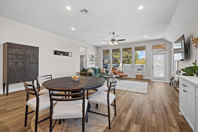 dining room featuring wood finished floors, baseboards, visible vents, recessed lighting, and ceiling fan