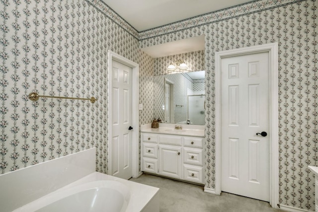 full bath featuring a stall shower, wallpapered walls, vanity, and a garden tub