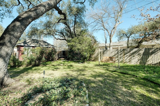 view of yard featuring fence