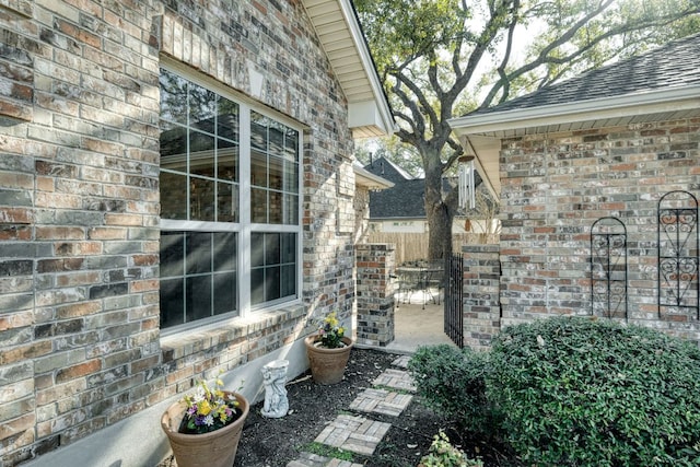 view of patio featuring fence