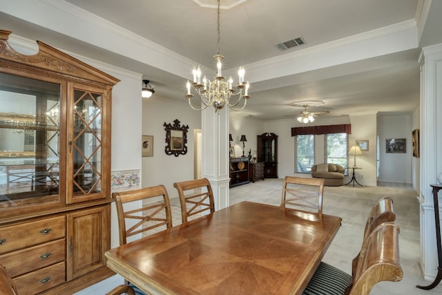 dining room with light carpet, ceiling fan with notable chandelier, visible vents, and ornamental molding