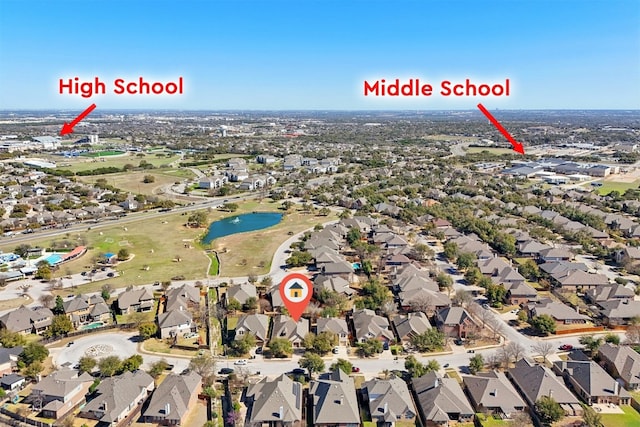 aerial view with a residential view and a water view