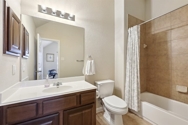 full bathroom featuring vanity, toilet, shower / bath combo with shower curtain, and tile patterned flooring