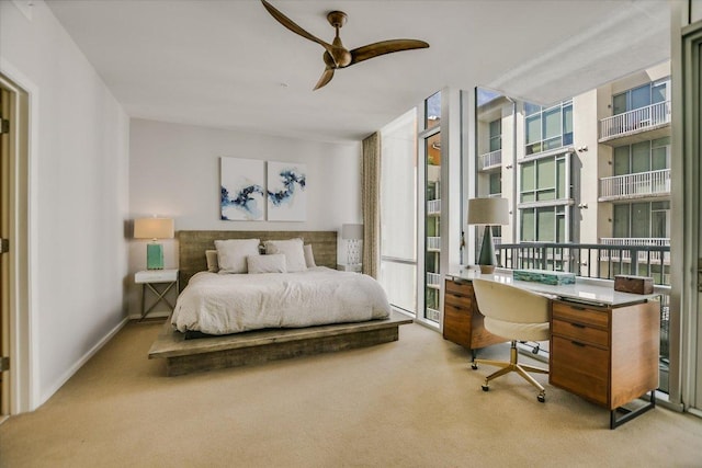 1600 Barton Springs Rd Unit 4401, Austin, TX 78704 - carpeted bedroom with expansive windows and baseboards