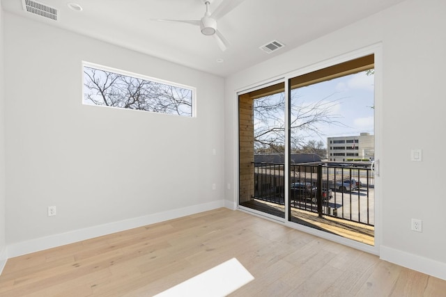 609 Hammack Dr Unit 2, Austin, TX 78752 - spare room with wood finished floors and ceiling fan
