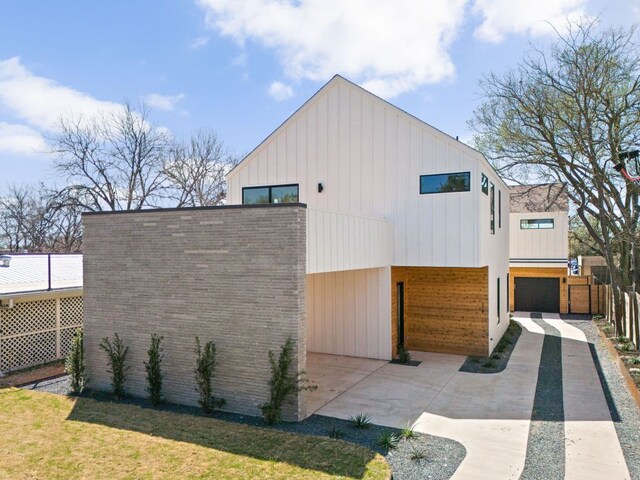 609 Hammack Dr Unit 2, Austin, TX 78752 - view of front of house with board and batten siding