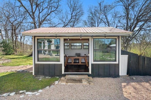 view of outdoor structure with an outdoor structure and fence