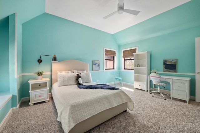 carpeted bedroom featuring ceiling fan, baseboards, and lofted ceiling