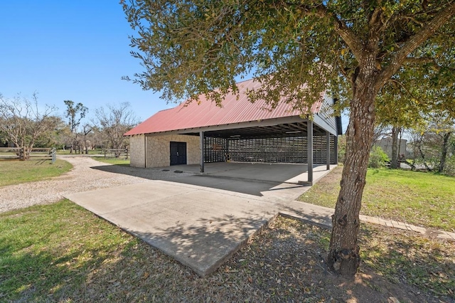 exterior space with a lawn and driveway