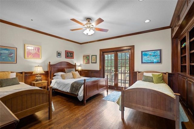 bedroom featuring crown molding, wainscoting, french doors, wood finished floors, and access to outside