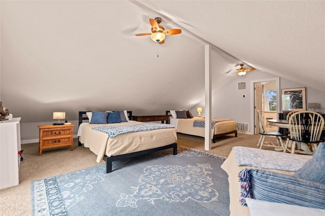 bedroom with a ceiling fan, vaulted ceiling, carpet, and visible vents