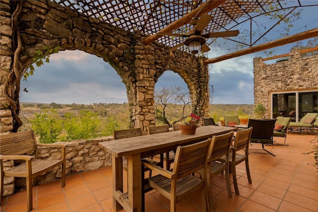 view of patio featuring outdoor dining area