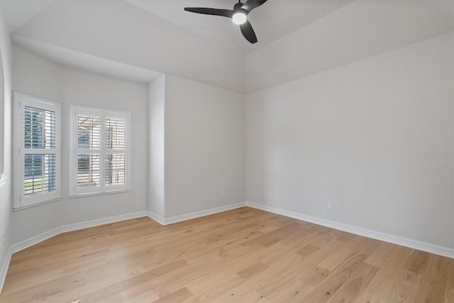 unfurnished room featuring light wood finished floors, baseboards, and ceiling fan