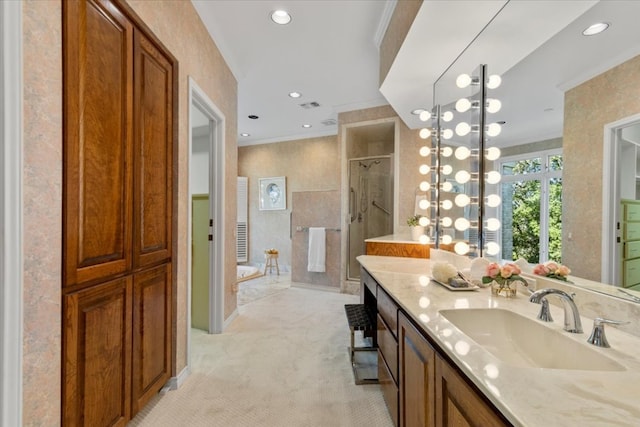 full bathroom with visible vents, crown molding, a stall shower, a bath, and vanity