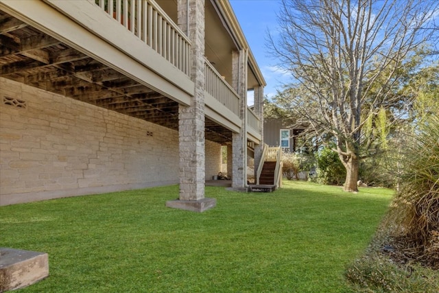 view of yard featuring stairway