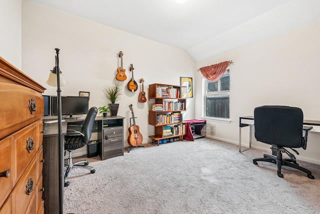 office featuring baseboards, carpet floors, and lofted ceiling