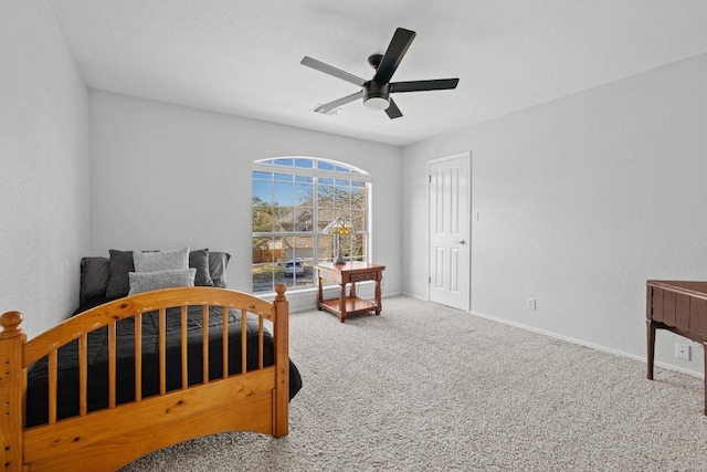 bedroom with carpet flooring, a ceiling fan, and baseboards