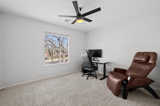 home office featuring carpet flooring, baseboards, visible vents, and ceiling fan