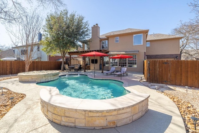 view of swimming pool with a fenced in pool, a patio, and a fenced backyard