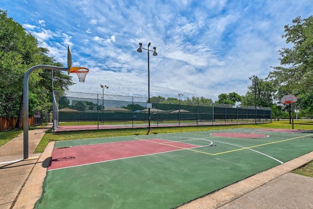 view of sport court with community basketball court and fence