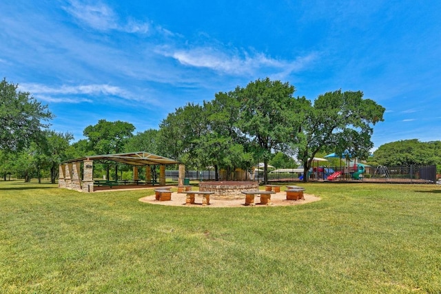 view of yard with a gazebo and playground community