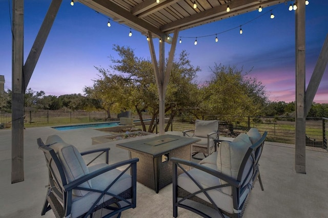 view of patio featuring a fenced in pool and fence