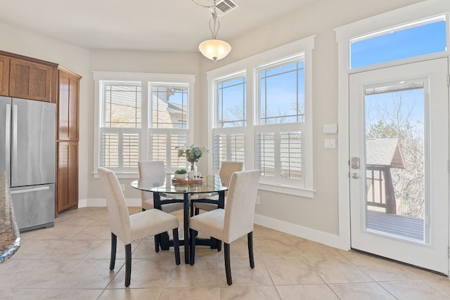 3129 Mill Stream Dr, Cedar Park, TX 78613 - dining room featuring light tile patterned floors and baseboards