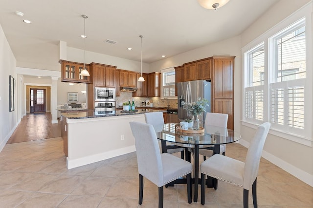 3129 Mill Stream Dr, Cedar Park, TX 78613 - dining space with plenty of natural light, recessed lighting, and light tile patterned floors