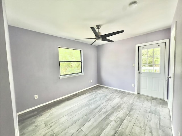 809 Bracewood Cir, San Marcos, TX 78666 - empty room featuring baseboards, wood finished floors, and ceiling fan