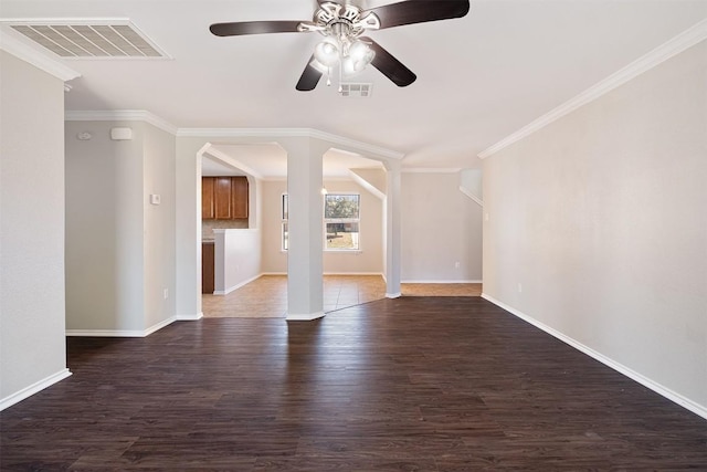 100 Snowy Egret Ln, Leander, TX 78641 - unfurnished living room with wood finished floors, baseboards, ceiling fan, and ornamental molding