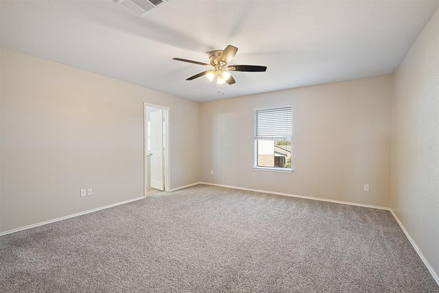 100 Snowy Egret Ln, Leander, TX 78641 - empty room featuring a ceiling fan, light colored carpet, and baseboards